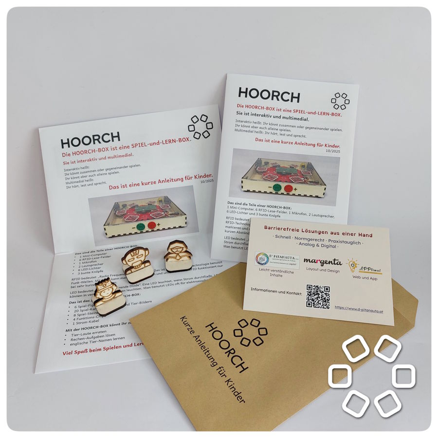Gedruckte Materialien zur Hoorch-Box sowie Figuren.